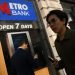 Metro Bank bosses buy shares as profits return
