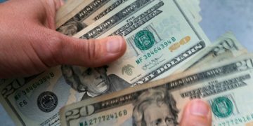 Dollar hits two-year high after robust US data puts brake on rate cut bets