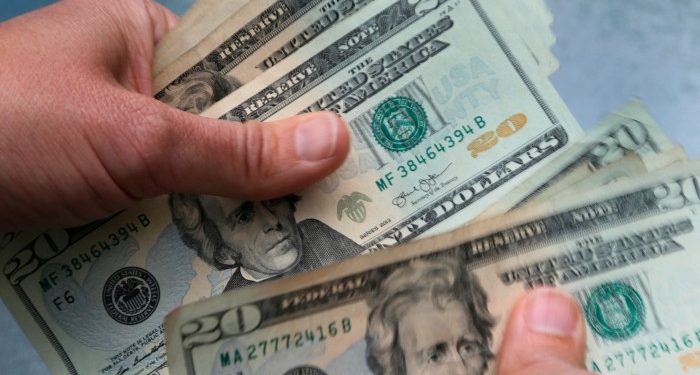 Dollar hits two-year high after robust US data puts brake on rate cut bets