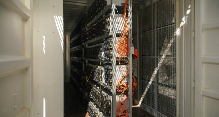 Bitcoin miners stockpile coins to ride out profit squeeze