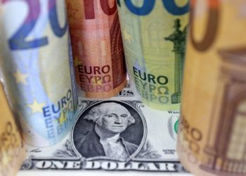 Dollar surges against the euro and sterling