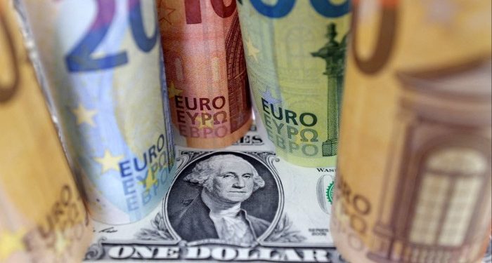 Dollar surges against the euro and sterling