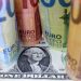 Dollar surges against the euro and sterling