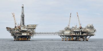 Biden bans new offshore oil and gas drilling along most of US coastline