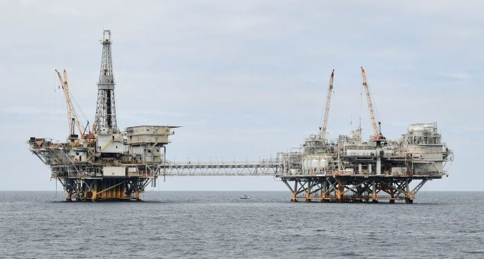 Biden bans new offshore oil and gas drilling along most of US coastline