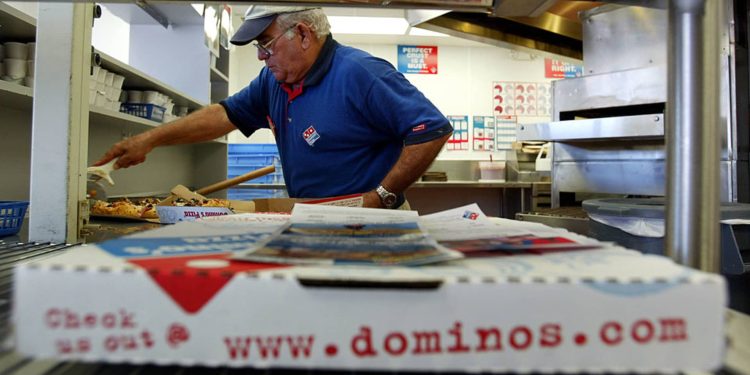 Stocks making the biggest moves premarket: DPZ, BABA, RIVN, PLTR