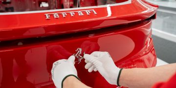 Stocks making the biggest moves midday: RACE, SPOT, PYPL, PLTR