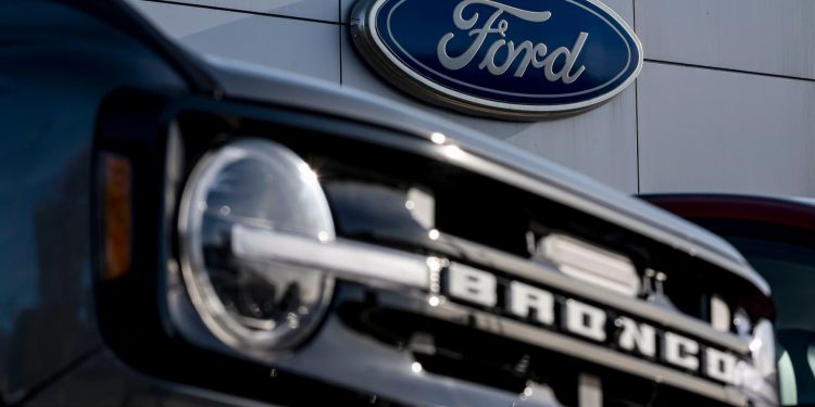 GM, NVO, KVUE, CRWD and more