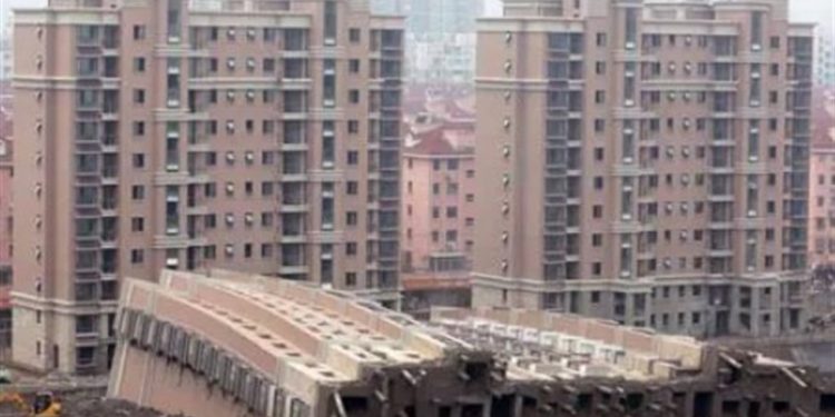 China sets record in bad asset disposals, shifts focus to housing market