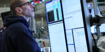 Global stocks soar as Trump backs down from trade war