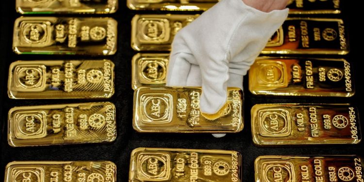 Gold hits $3,500 for first time as Trump’s attack on Powell rattles markets