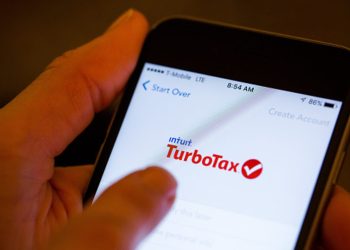 Stocks making the biggest moves midday: AAPL, ROST, INTU, BAH