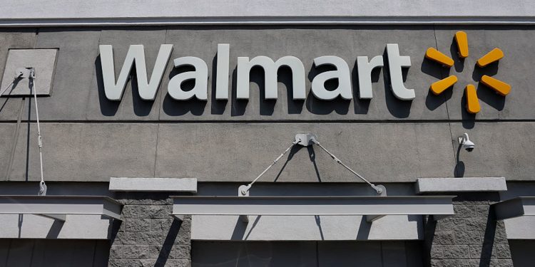 Stocks making the biggest moves premarket: WMT, DKS, UNH, BABA