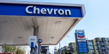 Chevron and Exxon profits drop as Trump trade war hits oil