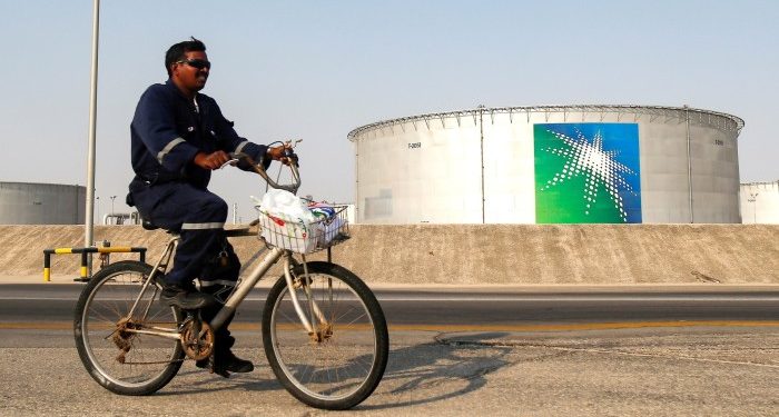 Saudi Aramco cuts its dividend by $10bn