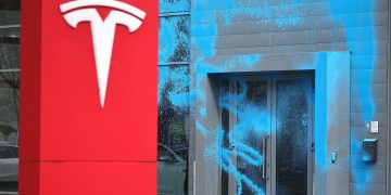 TSLA, BNTX, DKNG, STLD and more