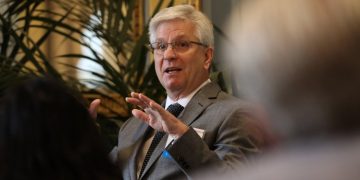 Top Federal Reserve official calls for rate cuts as soon as July