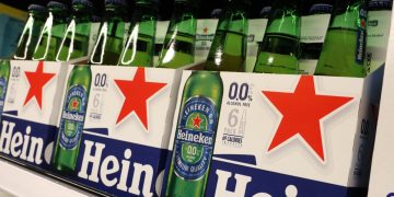 Stocks making the biggest moves midday: TSLA, NKE, RVTY, BUD