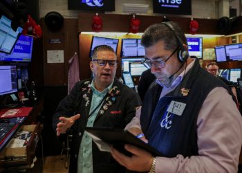Stocks making the biggest moves premarket: NFLX, AXP, CVX, SRPT