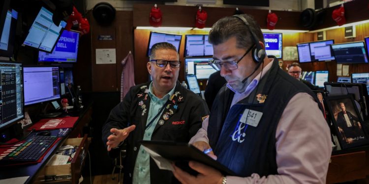 Stocks making the biggest moves premarket: NFLX, AXP, CVX, SRPT