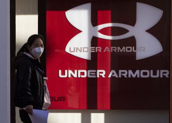 Stocks making the biggest moves premarket: UAA, EXPE, TTD, MP