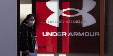 Stocks making the biggest moves premarket: UAA, EXPE, TTD, MP