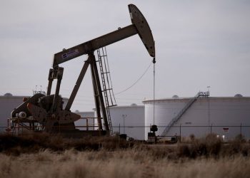 Oil settled nearly $1 lower as Trump-Putin talks loom