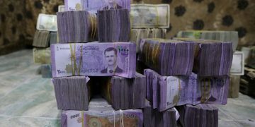 Exclusive-Syria to revalue currency, dropping two zeros in bid for stability