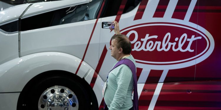 Paccar, Intel, RH, Riot Platforms and more