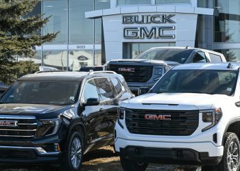 Stocks making the biggest moves premarket: GM, KO, MMM, PM