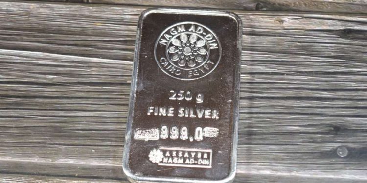 Silver trades to a new record high
