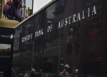 RBA’s Hauser says policy likely still restrictive but under review amid uneven data