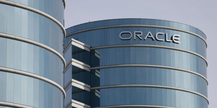 Stocks making the biggest moves premarket: ORCL, OXM, ADBE, GEMI