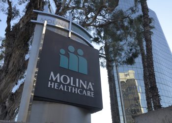 Stocks making the biggest moves midday: MOH, INTC, AXTI, OCFC