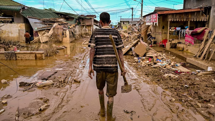 Indonesia revokes mining and plantation permits after deadly floods