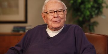 Warren Buffett says he sold Apple too soon and would buy more of it, though not in this market
