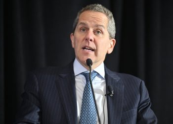 Fed’s Barr says rates may stay on hold “for some time” as inflation and oil risks persist