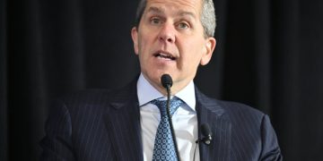 Fed’s Barr says rates may stay on hold “for some time” as inflation and oil risks persist