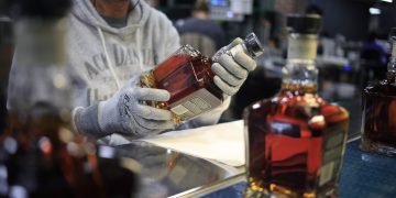 Stocks making the biggest moves midday: META, BF.B, AMZN, MRVL