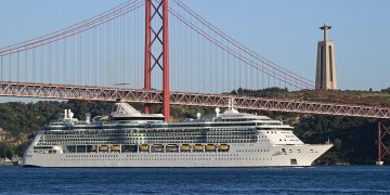 Stocks making the biggest moves midday: RCL, XOM, CRML, NFLX