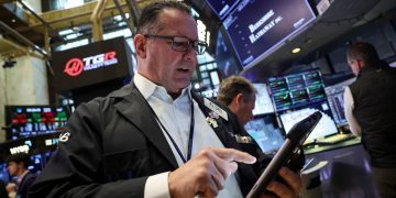 Stocks making the biggest moves premarket: ORCL, GM, KO, SPOT